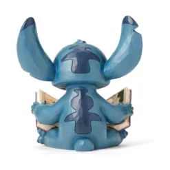 Disney Traditions Lilo et Stich - Stitch lisant un livre