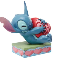 Enesco - Disney Tradition by Jim Shore - Lilo et Stich - Stitch câlinant un coeur